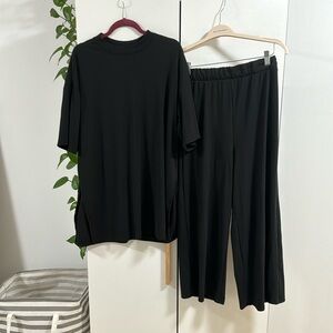 LALA ORIGINAL: Lex Ribbed Playsuit in Black